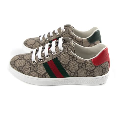 brown and orange gucci sneakers|Gucci gg supreme sneaker.